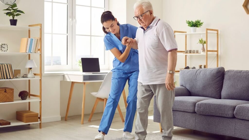 caregiver helping senior exercise